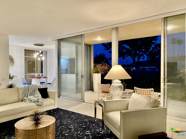 519 Desert Lakes Drive Palm Springs, California Move-In Ready! Newly "refreshed" Richard Harrison-designed mid-century 1 bedroom/2 bathroom 1,595 SF lower condo on golf course with sweeping southern mountain views plus single garage. Light and bright, 10 FT tall ceilings, new vertical blinds/shade, new Terrazzo-like 30" Spanish porcelain tile floors and Caesarstone quartz countertops throughout. New LG stainless steel appliances: refrigerator, electric range/oven, MW, DW and large stainless steel sink w/goose-neck faucet, ceiling fan + TV, new LED recessed lights and Bocce ball DR light fixture. Bathrooms have new vessel sinks, faucets, and toilets. All Interior & courtyard patio walls and cabinetry newly painted and fitted w/new hinges/hardware. New water heater and Whirlpool washer/dryer. MBR features a large walk-in closet plus a mirrored closet. Lots of storage in master bathroom with sunken Roman tub/shower. Large private sunny low-maintenance courtyard patio off the master suite. Known as the "Gem of the Desert," Seven Lakes Country Club offers the authentic Palm Springs lifestyle: 24/7 guarded front gate, Ted Robinson designed executive 18-hole (par 58) golf course, 15 pools/15 spas (most with Ramada, kitchenette, BBQ grill, restrooms, & showers), golf pro/pro shop, tennis court, William Cody clubhouse w/full service restaurant. Sellers hold active CA RE License.