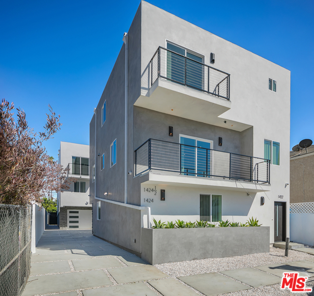 1424 S Redondo Boulevard Los Angeles, California This brand new contemporary townhouse-style triplex offers a rare opportunity in the finest area within the massively growing neighborhood of Mid City Los Angeles. The attention to detail and top-of-the-line finishes sets this new development apart. Positioned just a few steps from all the boutique shops on Pico Blvd. The property is secured by a remote-controlled steel gate. The front unit, the property's largest, has 5 bedrooms, including a private first-floor suite and a large master bedroom with a walk-in closet, and 4 and a half baths. The two back units (4 beds/2.5 baths & 3 beds/2.5 baths) provide very private living in the back structure. In all units, you will find a spacious & bright open layout with an abundance of light & beauty throughout. As you walk through the property, you will notice the captivating finishes that were selected with no expense spared. The property is equipped with full HD surveillance, Nest thermostats, high-end appliances, and Ring doorbells. Each door has a smart lock, which can facilitate the landlords experience with new lease tenants. Enjoy the ultimate Californian lifestyle, only 15 minutes away from Santa Monica, Beverly Hills, West Hollywood, & Downtown. An investors dream, Redondo is perfect for anyone looking to hold an amazing investment property they can live in and/or rent out in a phenomenal part of LA.