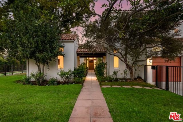 659 Via De La Paz Pacific Palisades, California Hidden behind a tall privacy hedge lies a custom-built home with magical gardens on a rare double lot in the prized Via Mesa. Designed to usher in light and relate to the lush surroundings, this inviting home has tall ceilings, wd. flrs., clerestory windows and Fr. Drs. opening to the garden and patios. Upstairs, 3BR & 2 BA plus the Primary ste. w/ ocean vw. deck. Downstairs, a room off kitchen could be off., gym or play rm. Detached office overlooking garden. The grounds invite year-round enjoyment with a patio for dining, entertaining and lounging, a lap pool, and a grassy expanse that inspires every manner of outdoor fun. Live the California dream within blocks of the Palisades Village.