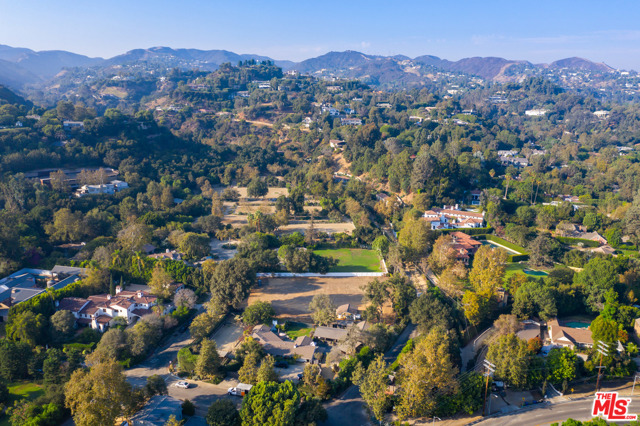 1614 Old Oak Road Los Angeles, California Incredibly rare opportunity to own your own private oasis in storied Sullivan Canyon. Tucked away behind Sunset Boulevard, and just a few miles from the Brentwood Country Mart and shops and restaurants of San Vicente Blvd, this hidden canyon community feels worlds away from the hustle and bustle of the city. A remarkable flat lot that is ideal for building a private estate amongst mature trees and prime California foliage. The property is zoned for equestrian use and is just steps away from the Sullivan Canyon Preservation riding facility. A natural setting that is peaceful and rejuvenating, and with easy access to every convenience. A must see for the most refined buyer looking to build their luxury lifestyle in the heart of Brentwood.