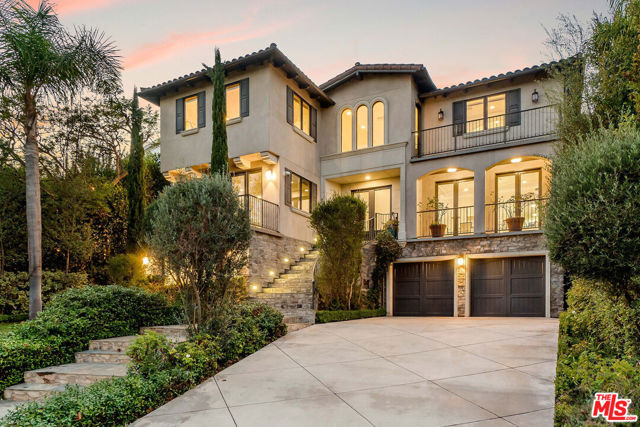 10259 Monte Mar Drive Los Angeles, California This newer built Mediterranean-style estate offers premier golf course living, incredible amenities and 7,070 SF of elegantly curated living across three stories. Enjoy a formal living room, a private office with built-in cabinetry and a great room with a two-story vaulted ceiling. The kitchen features Sub-Zero appliances, dual sinks, wine fridge, a spacious island and a butler's pantry. Glass doors lead to an outdoor paradise with a saltwater pool, spa, fireplace, cabana, outdoor kitchen and expansive grassy lawn. Upstairs are four large ensuite bedrooms and a lounge with a balcony. The primary suite has a fireplace, vaulted ceiling, an impressive walk-in closet and French doors that open to a private balcony with golf course views. An additional bedroom and a home theater with a wet bar are downstairs. A laundry room, security system, elevator and four-car garage add ease. Perched in the beautiful Cheviot Hills neighborhood, welcome to quiet, private living with the best of L.A. just moments away.