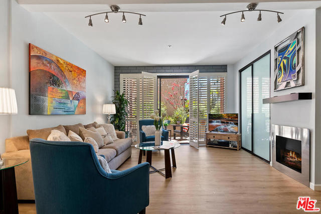 15515 W Sunset Boulevard 104 Pacific Palisades, California Located in the coveted heart of the Palisades Village, this remodeled single level condo offers an open floor plan, two patios and has no common shared walls. The kitchen was beautifully remodeled in 2021 featuring stainless steel appliances and water filtration system. The inviting living room flows out to a patio overlooking a garden area. The recent upgrades include new HVAC, flooring and lighting. The primary bedroom has a separate patio and walk-in closet outfitted by California Closets. The unit is set in the back of the complex which is buffered from Sunset Blvd. Amenities include a pool, sun deck, beautifully landscaped grounds, gym, spa and gated subterranean parking. Within one block of the property is Caruso's Palisades Village, Temescal Canyon hiking trail, Gelsons Market and schools. Available to show starting May 15th.