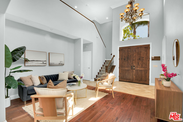 2031 WALNUT Avenue Venice, California Live your best life on one of the most coveted streets in Venice. Blocks away from restaurants, shops, beach and Abbot Kinney Blvd. Retreat into the tranquil bamboo backyard. This contemporary Mediterranean home has four bedrooms, three bathrooms, a formal living room and den, updated kitchen with high end appliances, and laundry room arranged in a family-friendly floor plan flooded with natural light.