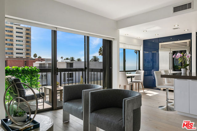 1007 Ocean Avenue 403 Santa Monica, California Stunning Ocean Ave condo with ocean and city views in an unbeatable Santa Monica location. Just a stones throw from the beach, the palm-studded Palisades Park, and The Promenade. This 3 bed + 2.5 bath unit has a sun-drenched open floor plan with just over 2,000 sqft, floor-to-ceiling windows, fantastic designer finishes, hardwood floors, and tons of built-in storage. Living room with fireplace, formal dining, and a large eat-in kitchen with Wolf and Subzero appliances, Miele dishwasher, and huge center island. A generous primary suite with en suite bath, marble counters, shower and soaking tub. Two additional spacious bedrooms (one is a den/office that could be used as the third bedroom). Topping it off is a private terrace with white water ocean views. Laundry in-unit, two parking spaces and additional storage in the gated underground garage. This secure building features an exercise room, sauna, steam room & pool -- all in the best location with access to everything Santa Monica has to offer.