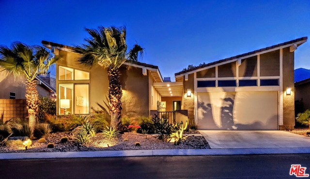 1295 Passage Street Palm Springs, California Elevate your lifestyle with this premium Escena Golf Course lot (fee simple - you own land). With truly epic "take your breath away" west-facing mountain views and tranquil golf course greenery views, you will be instantly transported into a Palm Springs state of mind. Sliding walls of glass create seamless indoor/outdoor living, soaring ceilings, custom lighting, gas fireplace, tile floors, and an extra-large open floor plan features the best of everything with many extra developer options. The Chefs Kitchen features upgraded cabinetry, quartz counters, stainless appliances, and a large center island, all located directly off of a private and cozy outdoor chat cove. The gigantic Master Suite has expansive views with an enormous walk-in closet, dual-sink vanity and 12-foot shower. Yard features a large covered patio, saltwater pool & spa, and firepit. Landscaping has been upgraded with the finest of desert specimens and evening lighting. Truly one of the most spectacular homes in Escena, with a premium lot that is unparalleled for mountain views! The home is also located very close to Escena Golf Club/Restaurant, and a community dog park for the pooches!