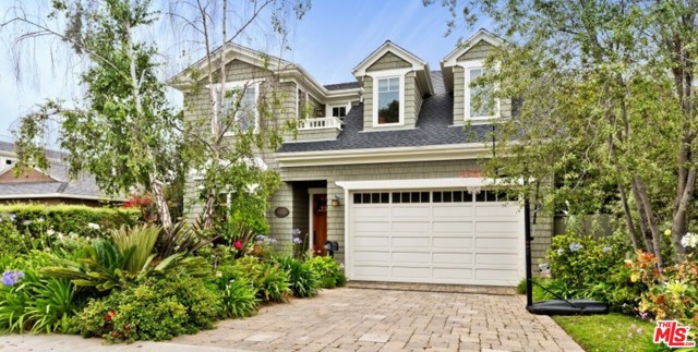 16032 MIAMI Way Pacific Palisades, California Absolutely charming East Coast Traditional with high quality craftsmanship and timeless designer finishes. Classic Hamptons style home in the El Medio bluffs neighborhood - convenient to bluffs, schools, Village shops & restaurants, and the beach. Formal living and dining rooms with beautiful wood work. Large eat-in kitchen with gorgeous marble counters connects to the bright family room with wood built-ins and fireplace. The main level also has one guest suite, plus an elegant powder room. The upper level consists of a fabulous primary suite complete with spacious sitting room/office area, walk-in closet and beautiful marble bath. Another large en suite and jack-and-jill are located upstairs. Wood floors throughout. Private yard with full bbq station/bar, outdoor fireplace and patio, plus grassy area. Available late August for 1-2yrs. Small dogs and cats ok.