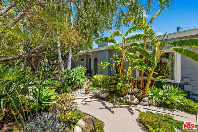 16770 Livorno Drive Pacific Palisades, California Offers are due on Tuesday, 4/27 by NOON. Opportunity knocks! This charming and immaculate three-bedroom, 1 3/4 bath home is a retreat behind a privacy wall that belies the lovely front garden within. Enter the home from pathways winding through the lush landscaping and be surprised to find a large, airy, and exceedingly light living room, kitchen, and dining room. There are several skylights throughout the home which adds to the light-filled ambiance throughout. The kitchen has newer appliances and a built-in cabinet for the included washer and dryer. French doors lead to the rear yard with a large deck and small grassy area. This is an As-Is sale.