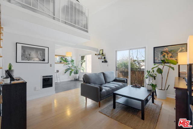 1125 Pico Boulevard 209 Santa Monica, California Live the Penthouse life in the heart of Santa Monica less than 2 miles to the beach! This striking top level 1 bedroom 1 bathroom features a bonus loft that can be used as a 2nd bedroom/office. Featuring maple wood floors throughout with a dramatic 18ft high ceiling in the main living room with lots of natural light and an expansive private balcony west facing. This top level unit is the epitome of privacy and living above the crowd. Unit offers two parking spots in a gated garage. Easy access to the freeway and striking distance to the beach, Main street, 3rd street promenade, Santa Monica College, and all the Award winning shops and restaurants. A great opportunity not to be missed!