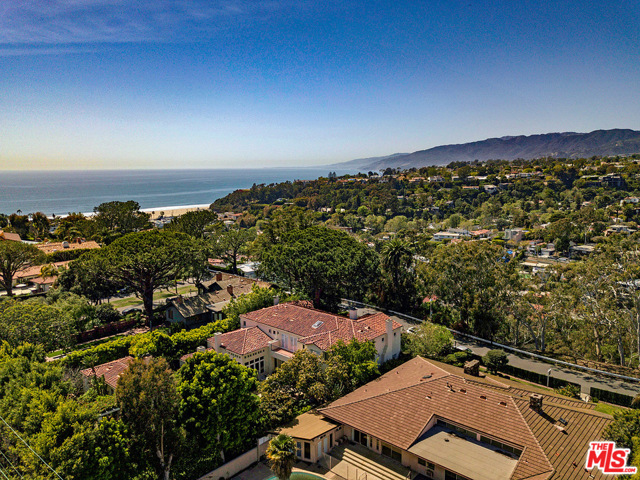 430 ADELAIDE Drive Santa Monica, California An amazing and rare opportunity to create your dream sanctuary on Santa Monica's most sought-after street. A beautiful canvas awaits your creative vision to build, develop or remodel the existing mid-century home. This unique and private property sits on a large, wide open and fully usable parcel with sweeping canyon, mountain and ocean views. The lot square footage includes APN# 4293-001-003 (approx. 19,642 sq. ft.) and APN# 4410-002-039 (approx. 3,731 sq. ft.) which further protects your expansive views. Don't miss this chance to jump in now and be one step closer to your heart's desire. The location is ideal for everything Santa Monica living has to offer from beaches, shopping, restaurants, hiking, and gorgeous sunsets from your very own Pacific Coast oasis. Easy to show.