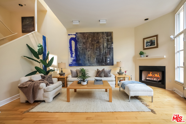 231 Bay Street 3 Santa Monica, California Enjoy California living at its best at Casa Bay, a group of timeless modern homes designed by well-known architect William D. Brantley. This impressive 2 bedroom with oversized den with contemporary design offers dramatic curb appeal set against the backdrop of a palm tree-lined street, all within a few short blocks to the beach. This amazing home offers a design aesthetic reminiscent of the early International Style. The recently renovated property showcases a well-appointed kitchen with professional Thermador appliances, a generous floor plan over two levels, and expansive vaulted ceilings. All highlighted by intricately placed windows allowing cascading natural light to illuminate the warmth of the wood floors and the neutral pallet. Delight in the spacious living room and office/den which opens to tranquil private patios accented by lush greenery. A comfortable serene master suite completes the space. Make your way to the rooftop deck to relax in the sun and enjoy the ocean breeze!