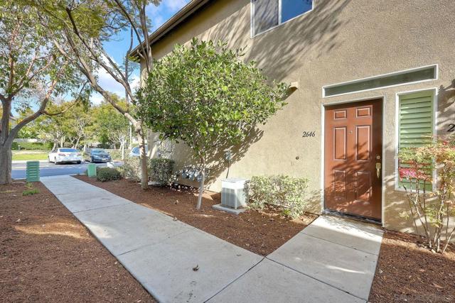 Nice walking path to the front door.  Fresh mulch applied by the HOA looks nice!