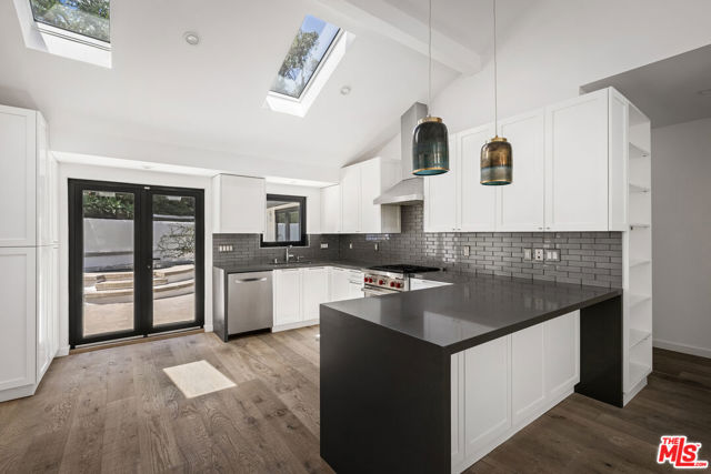 2425 Rinconia Drive, Los Angeles CA: https://media.crmls.org/mediaz/a0318c07-3ae3-43ff-8dcd-a44535602497.jpg