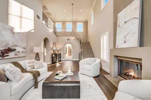 Formal Living Room with High Ceilings and Large Picture windows