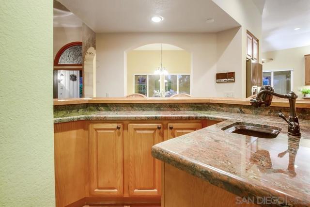 14442 Ranch Trail Drive, El Cajon CA: https://media.crmls.org/mediaz/a0a7b0f1-9c00-4a27-a555-bae31b8883e7.jpg