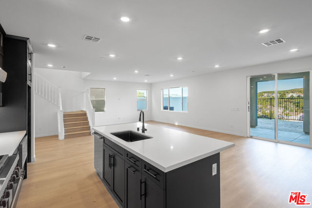 23725 Orange Blossom Dr, Newhall CA: https://media.crmls.org/mediaz/a0adcf6e-0ea5-40e5-9398-da403f18c27c.jpg