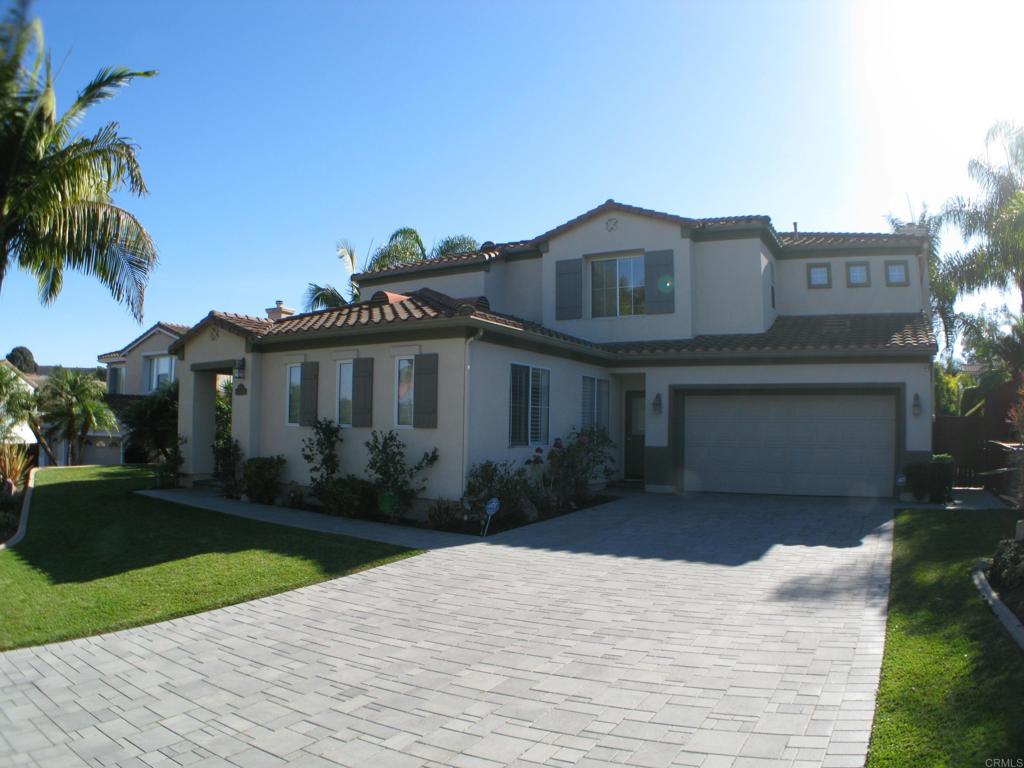 Nestled in the prestigious Evans Point neighborhood of Carlsbad, this stunning 4-bedroom plus office, 3-bathroom home is located just 2 miles from the beach, the property boasts a spacious backyard with a covered patio, a sparkling pool and spa, and mountain views, making it perfect for entertaining or relaxing. The home has been meticulously upgraded with high-end finishes and features a versatile downstairs bedroom and bath, ideal for use as a home office. Recent upgrades include a new heater, A/C, pool heater, pool pump, and ceiling fans in every room. The EV-ready garage with a 220V 3-phase plug, paver-lined driveway, and immaculate interior further enhance its appeal. The large, usable yard is perfect for a dog run or game area, and the home’s excellent condition reflects pride of ownership. Don’t miss this rare opportunity to live in a dream home in a highly coveted neighborhood!