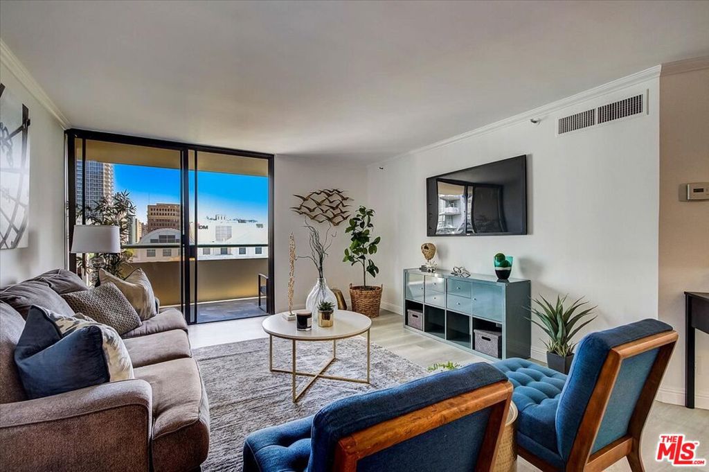 Currently, the largest interior square foot unit for sale in the community, this stunning CORNER-unit condo boasts city light and skyline views!  Located in the popular South Park area of DTLA, this home was remodeled this year, 2022! This gorgeous unit has been updated and presents itself like a new construction interior. Improvements include a chic kitchen with Quartz countertops, recent paint, and new appliances. You will love the soft-close cabinets and drawers, and the recently opened wall provides a breakfast bar. The open-concept living /dining area is set just off a formal foyer entry and is impressive and expansive, with updated fixtures and postcard views. Luxury, laminate flooring; fresh interior paint; recessed lighting; new crown molding; smooth "popcorn ceiling removed" studio-style ceilings; and a tile-floored balcony are only a few of the smart improvements! Units in the "16" stack of this building are unique as they have larger floorplans with a split bedroom layout and only 1 attached wall. The master suite is set privately from the secondary bedroom and boasts a new double vanity; two large closets; a step-in shower; and a big, beautiful window. The other bedroom has great views of DTLA landmarks like the Eastern Building and has access to the balcony, too. You will love the multiple closets that provide plenty of storage space in this unit! Living at Skyline is like living at a resort as it offers a gorgeous pool; spa; fitness center; sauna; park-like grounds; racquetball court; BBQ/picnic area, and more. 24-hour front desk security, controlled-access entry, and elevators, too! Located across the street from Ralph's; next door to Starbucks; and with Target; The Bloc; Whole Foods; LA Live; Macy's; The Metro Red Line; and some of the best entertainment; dining; retail; services mere steps away! This is the first transfer of ownership for this unit as it has been kept in the same family for decades - this is a rare gem!