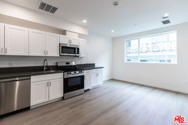 1227 N Berendo Street, Los Angeles CA: https://media.crmls.org/mediaz/a277c542-ee8f-45b9-8671-ffb7cd86faa3.jpg