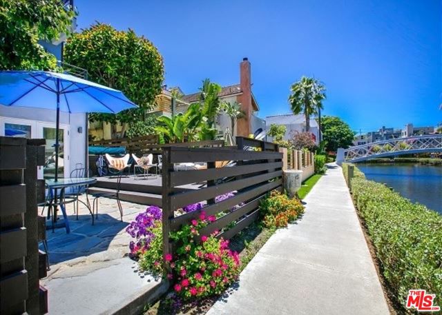 218 CARROLL CANAL Venice, California Sensational architectural home in Prime Silicon Beach Venice Canals. Great location on the canals, close to beach and restaurants etc. First level studio with full bath opens to canal-front patio, with direct access to the canals. Second floor features an open kitchen and living room with high ceilings and French doors leading out to a large patio overlooking the canals. Two office suites also occupy the home's second level. The third-floor master suite is ideal with canal frontage, patio, and luxurious bathroom with steam shower. There are two additional bedrooms on the third level with secluded and rooftop decks with incredible ocean and city views. One of the few canal homes with a pool. Dialed-in in design and outfitted with tech comforts -- three-zone HVAC, Nest system, security cameras, and more. Minutes from the beach and Abbot Kinney. The home has been extensively remodeled. Ideal for Live / Work.