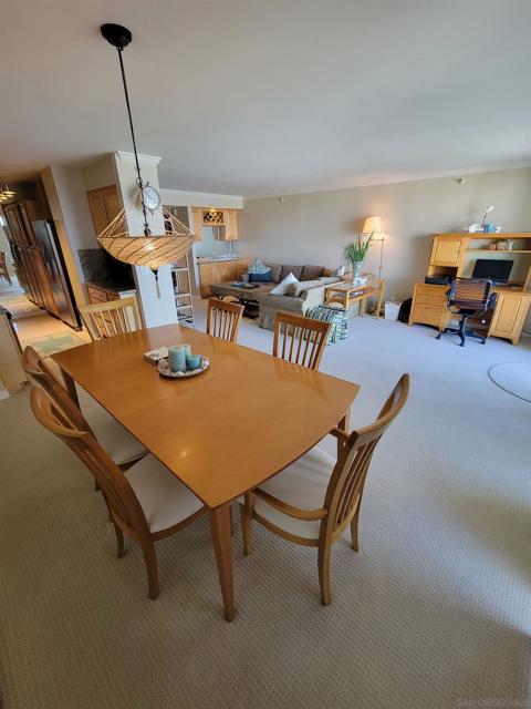 Large dining area communes well with the living room and kitchen.