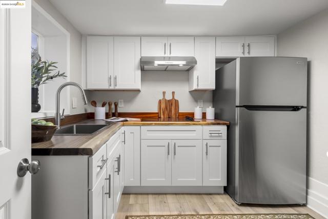 2050 E 30Th St, Oakland CA: https://media.crmls.org/mediaz/a39a7f2f-90a3-45af-ac7c-65779f255818.jpg