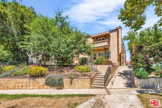 1073 S Mansfield Avenue, Los Angeles CA: https://media.crmls.org/mediaz/a3e3def0-4705-4411-94e1-a48efaa271f4.jpg
