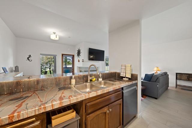 12132 Royal Birkdale Row Unit 104E, San Diego CA: https://media.crmls.org/mediaz/a424a01d-5baf-464b-96aa-44af4d9d0894.jpg