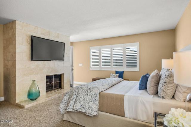 Primary bedroom with fireplace