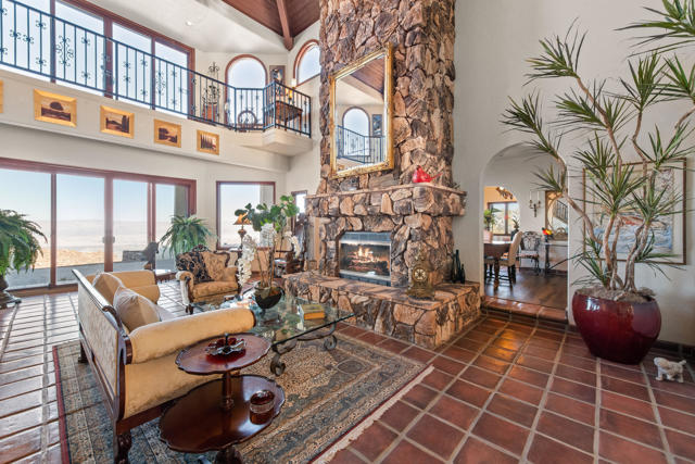 Floor-To-Ceiling Stone Fireplace