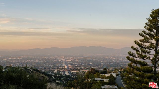 14527 Mulholland Drive, Los Angeles, California 90077, 3 Bedrooms Bedrooms, ,2 BathroomsBathrooms,Single Family Residence,For Sale,Mulholland,25500555