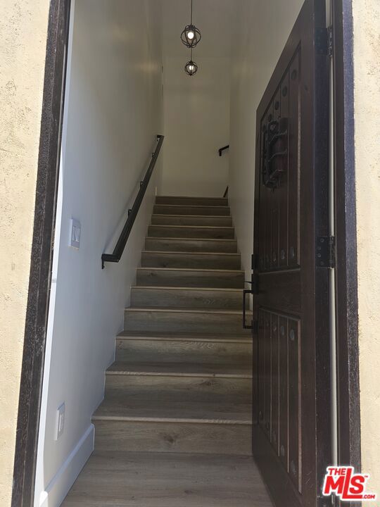 5247 1/2 W 9th Street, Los Angeles CA: https://media.crmls.org/mediaz/a522fe08-ba97-4bf1-bc9e-90e5529d70d5.jpg