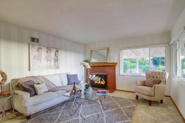 Spacious living room with cozy wood burning fireplace!