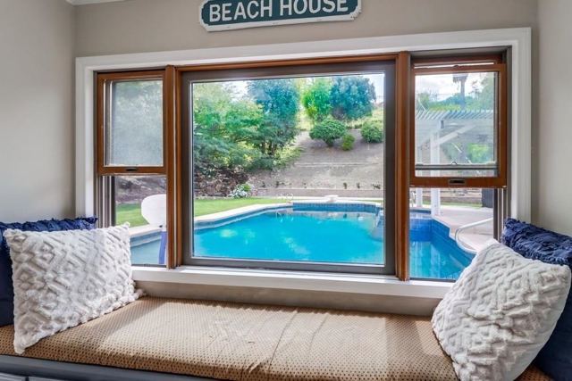 Lovely window seat niche with view to pool!
