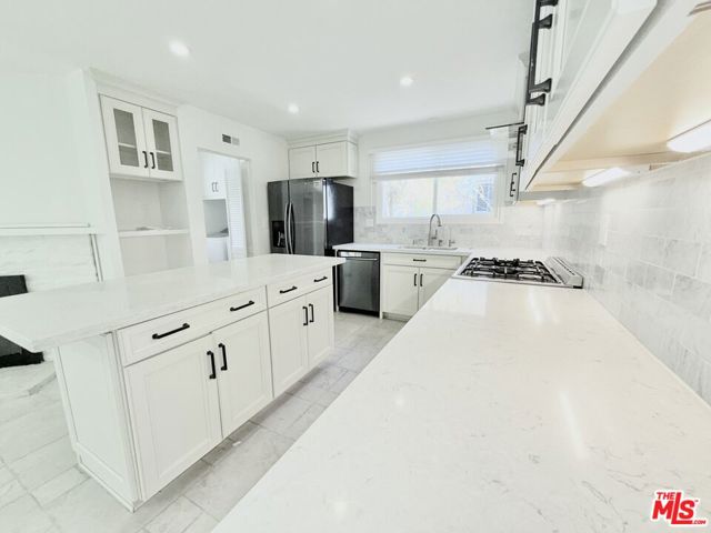 23744 Hartland Street, West Hills CA: https://media.crmls.org/mediaz/a5ac3f8d-0a11-45bc-aea3-13f471b98956.jpg