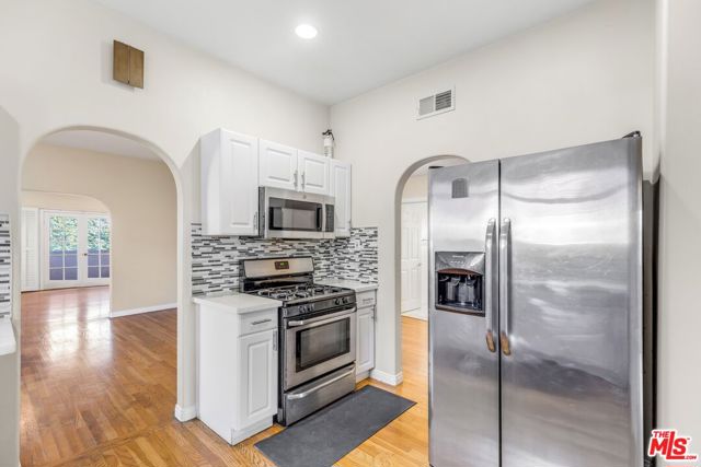 1073 S Mansfield Avenue, Los Angeles CA: https://media.crmls.org/mediaz/a5fca8d8-4b56-44fc-892a-8645552ed3c8.jpg