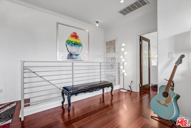 1153 N Formosa Avenue, Los Angeles CA: https://media.crmls.org/mediaz/a624a2c7-ac16-479e-a2b7-a628a5e09a47.jpg