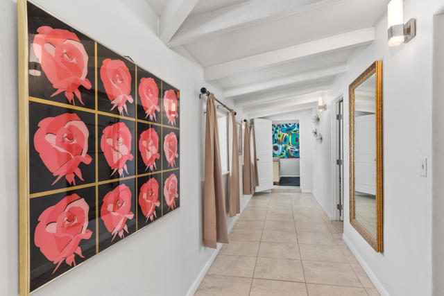 Hallway to bedrooms and den