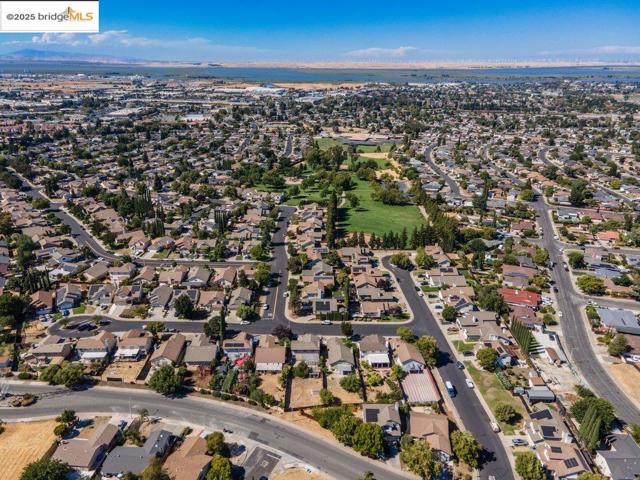 View of property location with nearby suburban area
