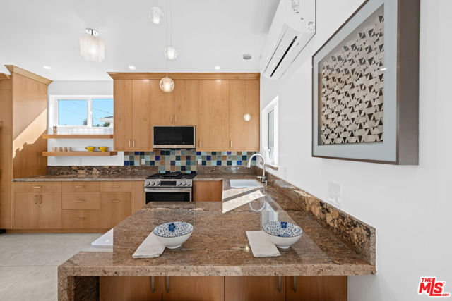 10623 W Olympic Boulevard, Los Angeles CA: https://media.crmls.org/mediaz/a6e4bd21-a385-4e88-82ea-63724f51e8e9.jpg