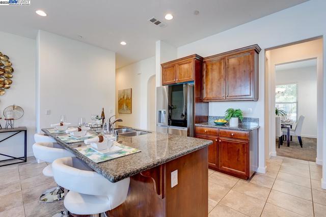 1440 Riva Trigoso Dr, Manteca CA: https://media.crmls.org/mediaz/a6fdccb3-1217-4e40-bb54-c341b0c28957.jpg