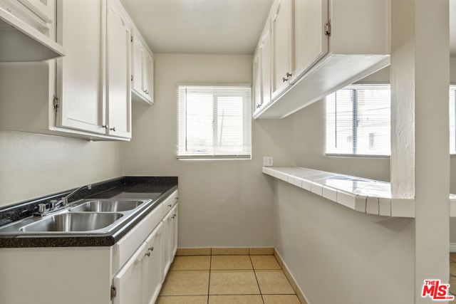 11204 S Broadway, Los Angeles CA: https://media.crmls.org/mediaz/a70376fd-6f8e-4daa-9263-30e9c0c3aad6.jpg