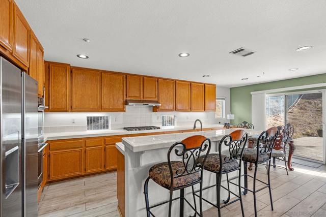 The bar! For those who like to sit and watch the mom cook, there is space for bar stools!!!