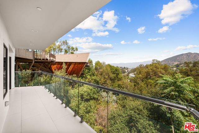 7141 Woodrow Wilson Drive, Los Angeles CA: https://media.crmls.org/mediaz/a77c55f4-cfd8-4f38-a283-d96f7f9b8c3b.jpg