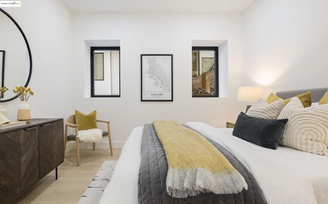 Bedroom featuring light wood finished floors and baseboards