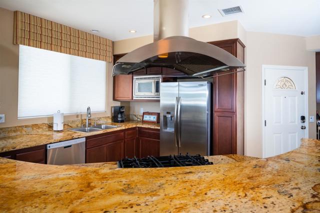 Granite countertops, gas range and miles of non-stop views!