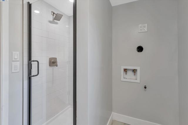 Downstairs shower with Bluetooth speaker