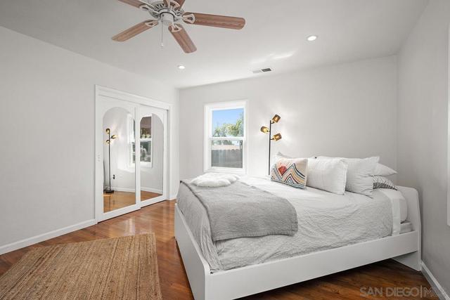 3rd upstairs bedroom; orientation back of the house with backyard views.