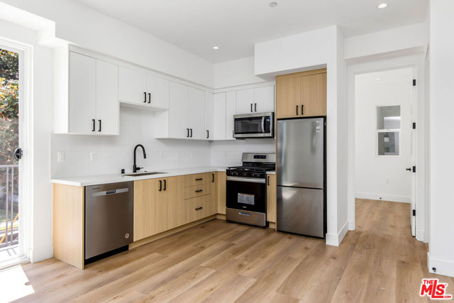 11241 W Morrison Street, North Hollywood CA: https://media.crmls.org/mediaz/aa62cbef-4db6-4d47-a382-f45c5cf1faf4.jpg