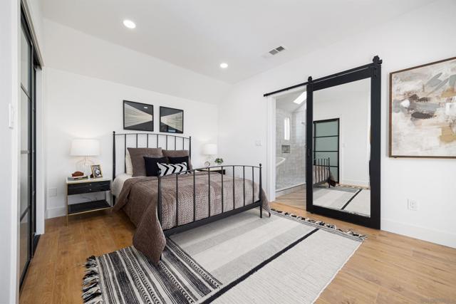 Primary bedroom with deck overlooking the ocean