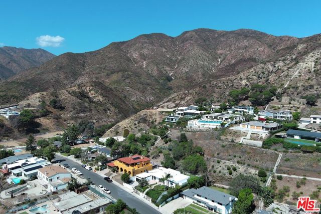 Drew Fenton | 18073 Sandy Cape Drive Pacific Palisades CA | MLS: 7432418